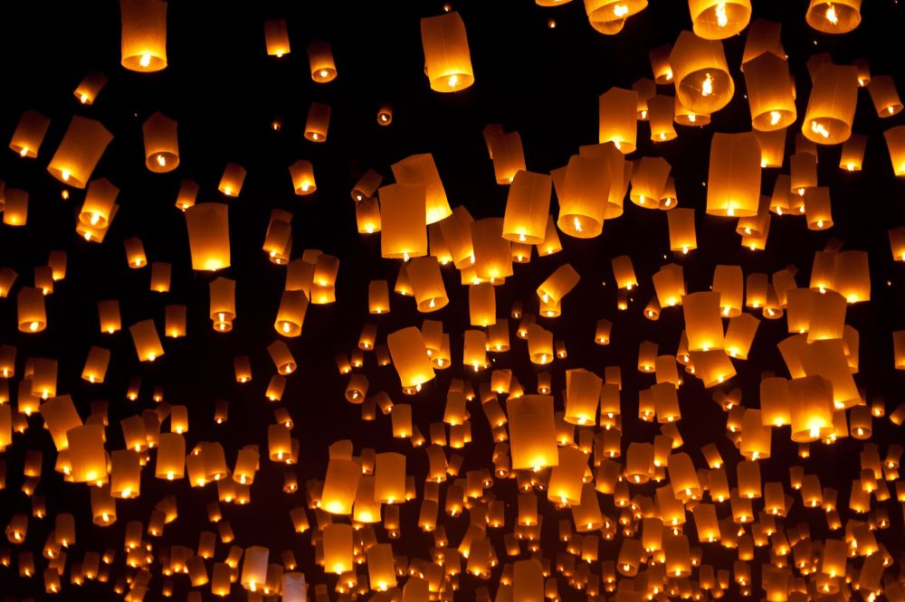 paper lanterns floating away.