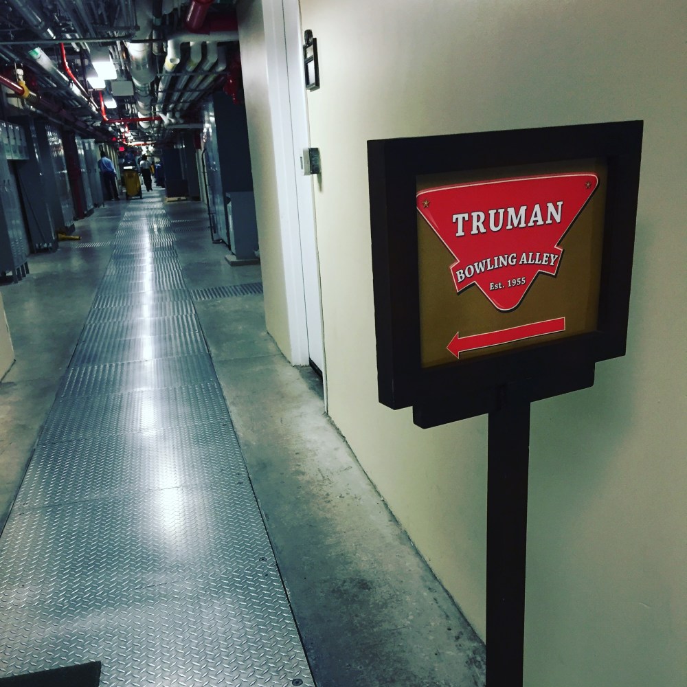 bowling sign in the scary basement.