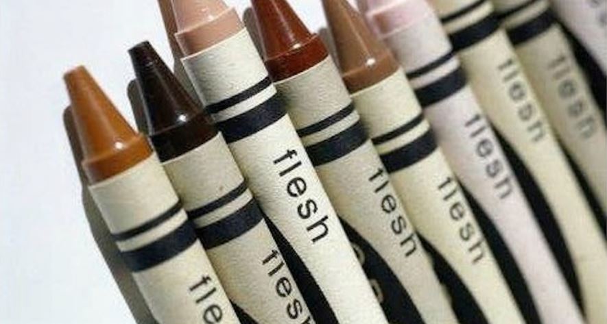 A selection of crayons that show a spectrum of color, all called flesh.