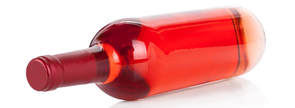 A bottle of rosé wine. Prone.