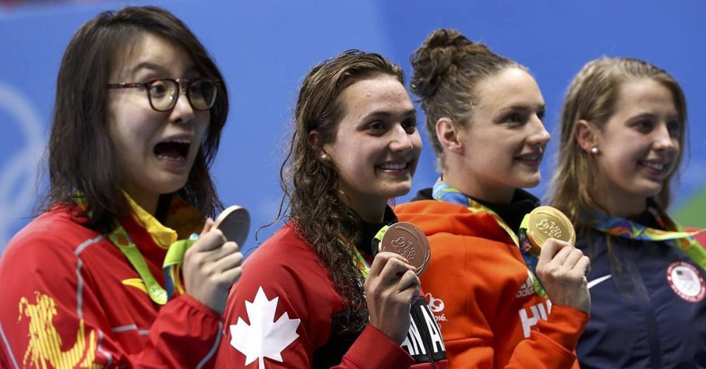 Medalist in the 100m backstroke, Fu Yuanhui (China) Kylie Masse (CAN), gold medalist Katinka Hosszú (Hungary) and (USA) Kathleen Baker.