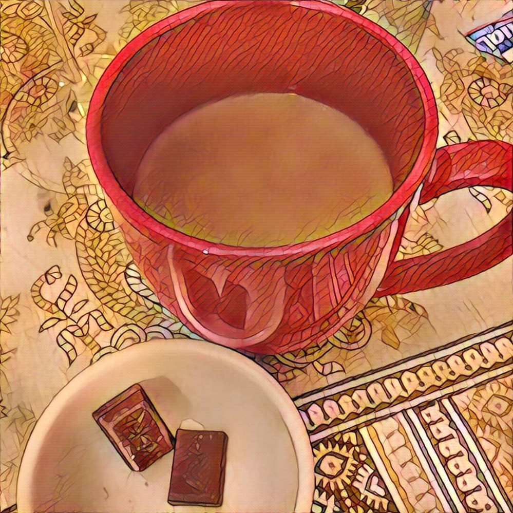 Red mug and little bowl with chocolate.
