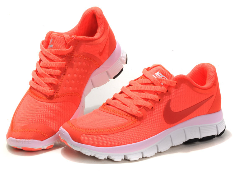 Bright orange sneakers.